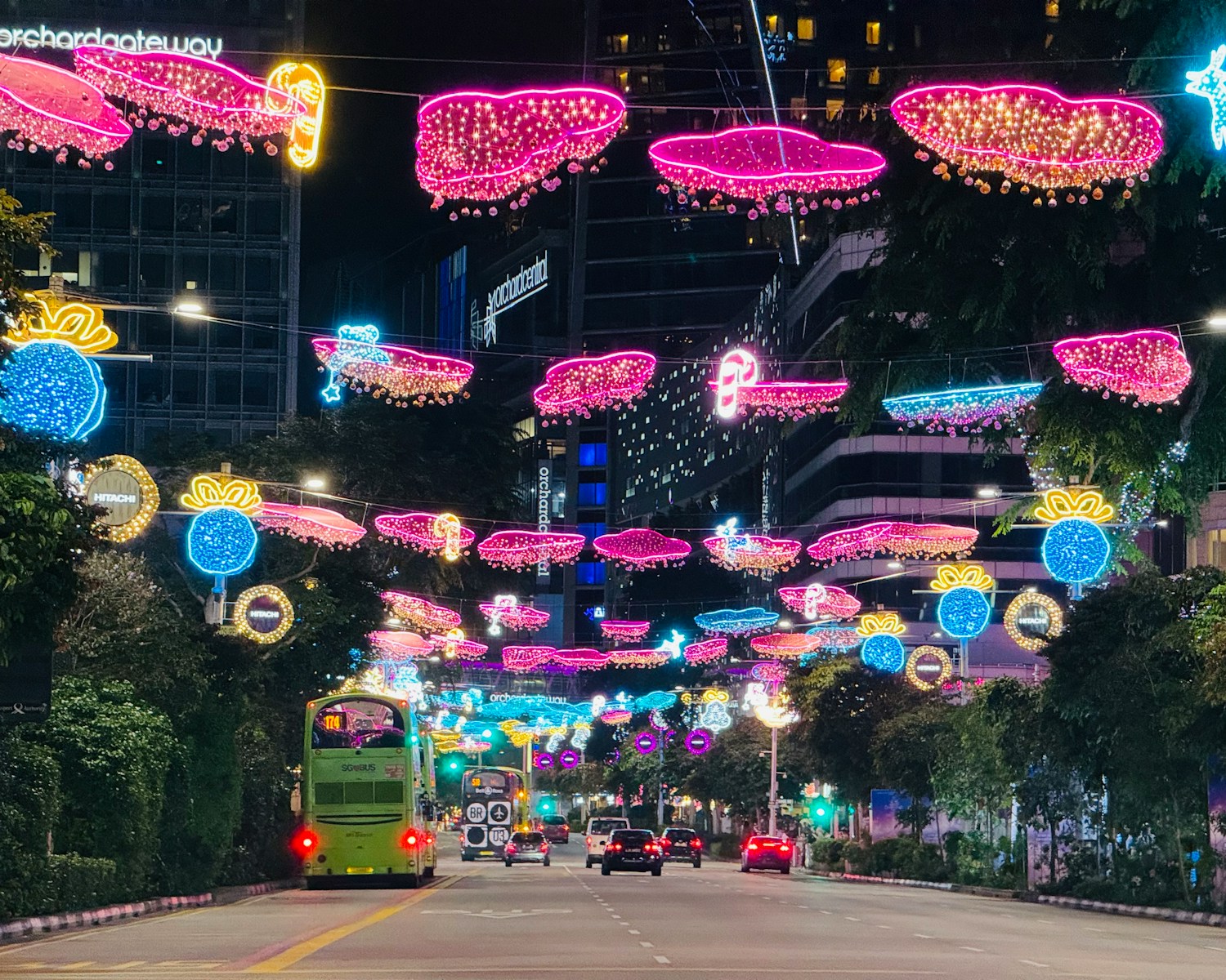 a street filled with lots of lights and decorations