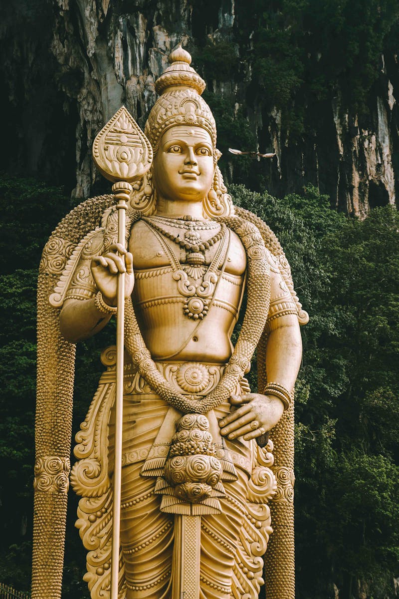 Golden statue of Lord Murugan at Batu Caves in Kuala Lumpur, Malaysia.