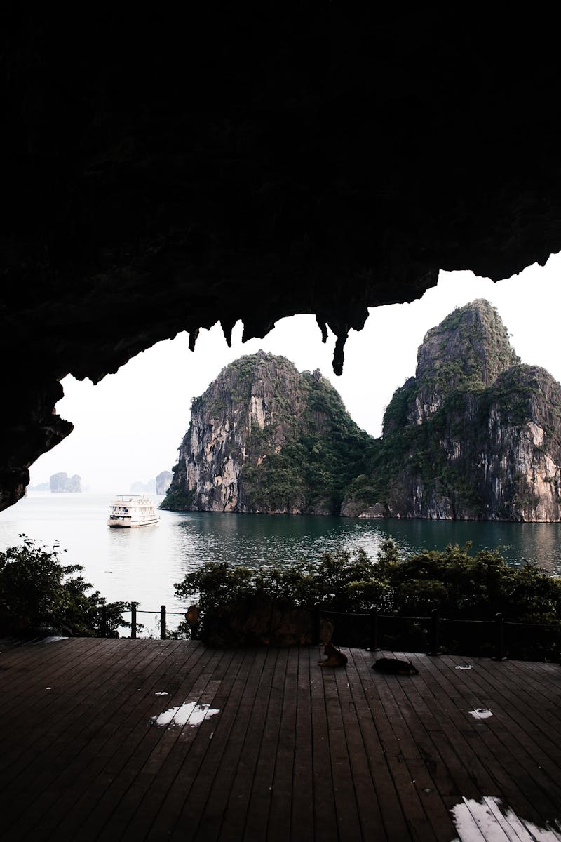 A breathtaking view of Ha Long Bay, Vietnam from a cave with limestone formations.