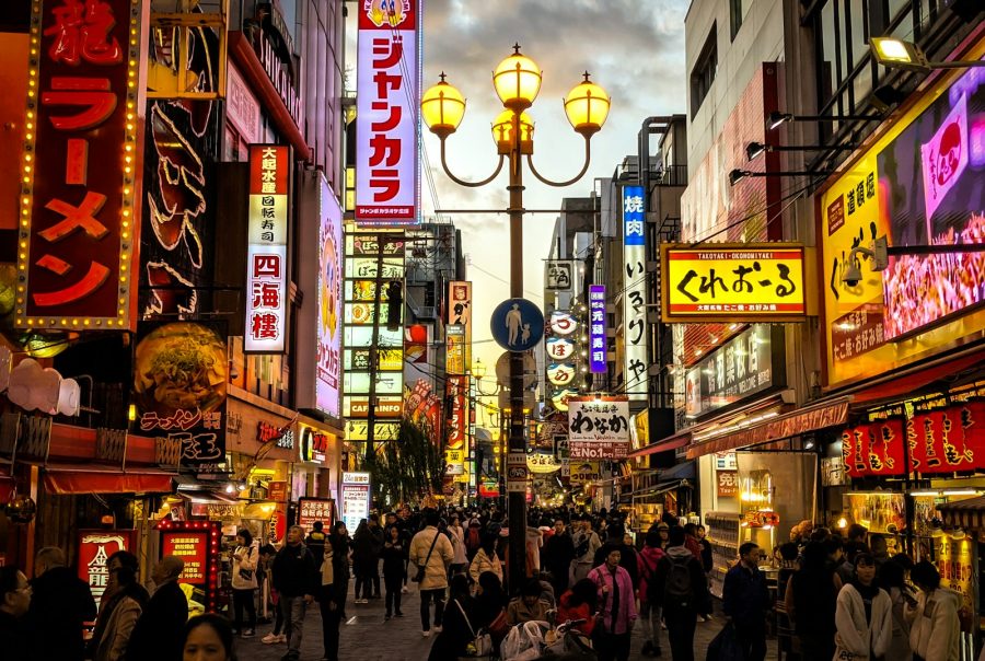 people walking on street during nighttime