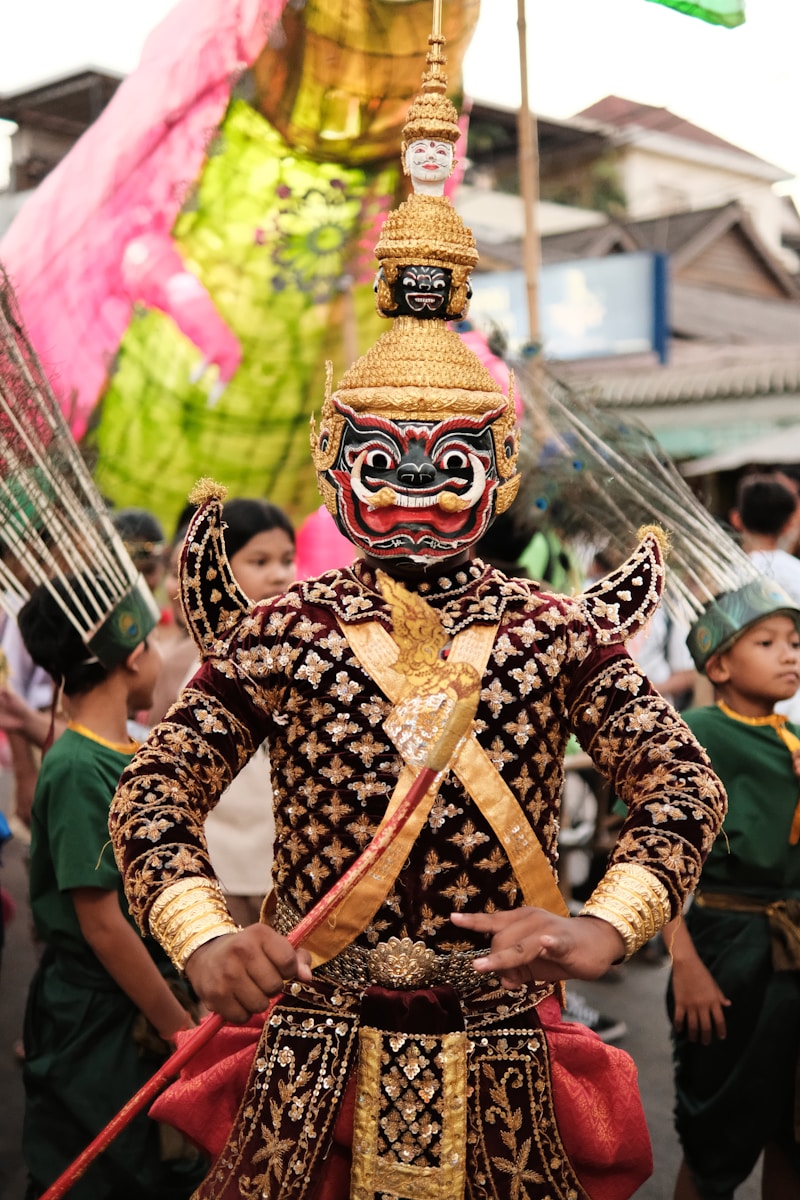 a man in a costume standing in front of a group of people
